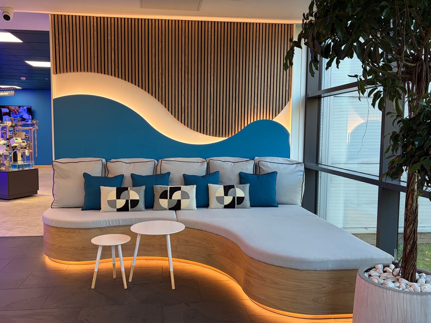 Colour branded seating and cushioning area in atrium